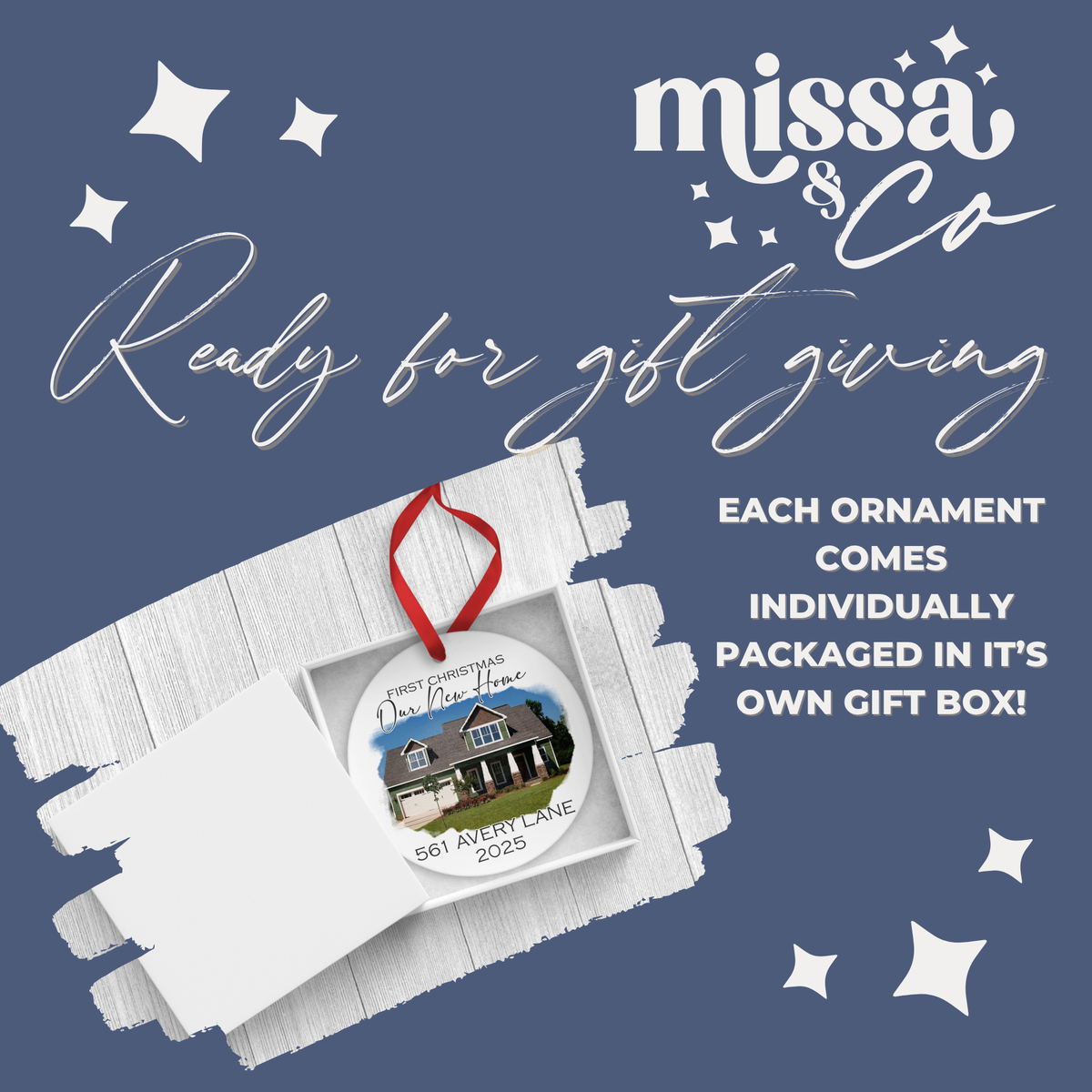 Personalized new home ornament in a gift box with 'missa & Co' branding on a blue background.